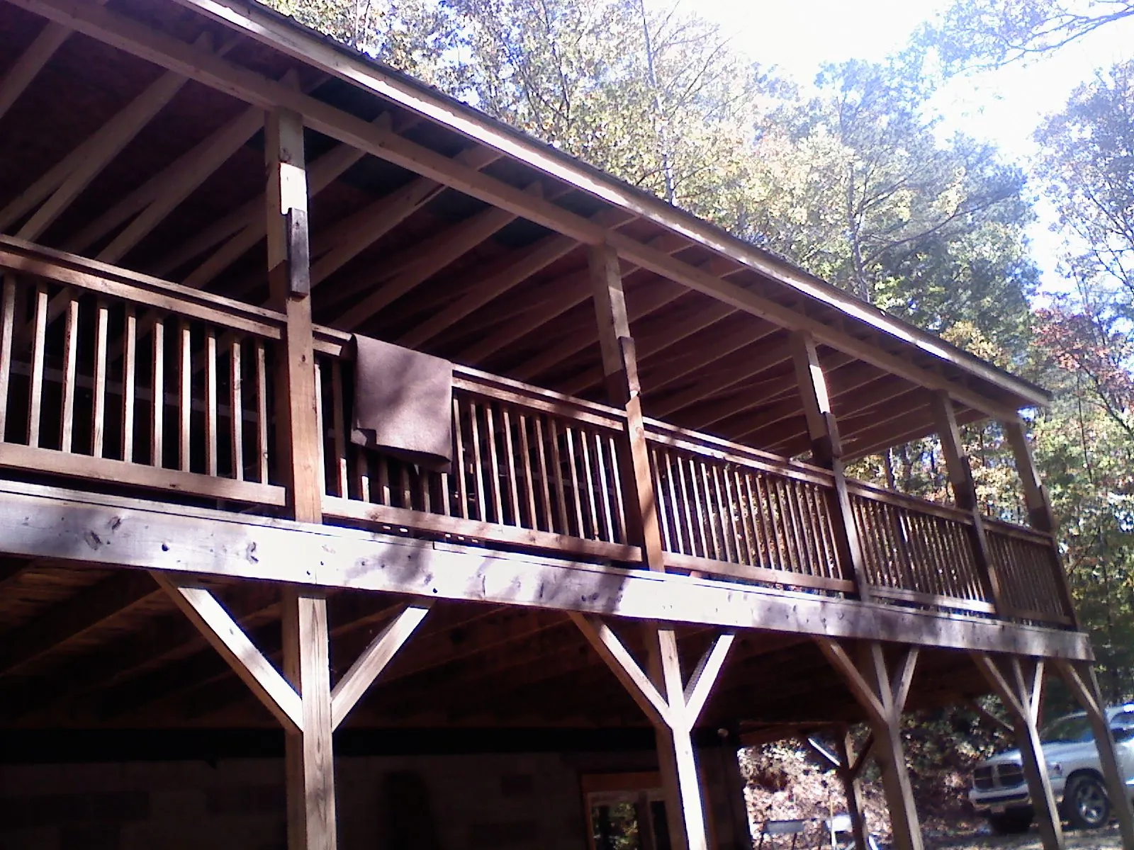 Timber framing under a new elevated porch and deck — Roof Leak Repair in Maple Plain by Roofing Brothers
